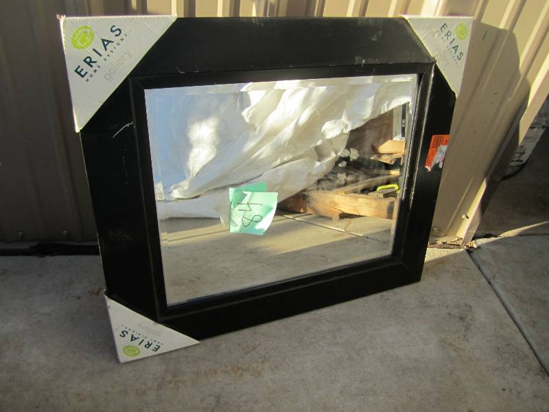 lot 84 image: 23.5 x 27.5 black framed mirror...