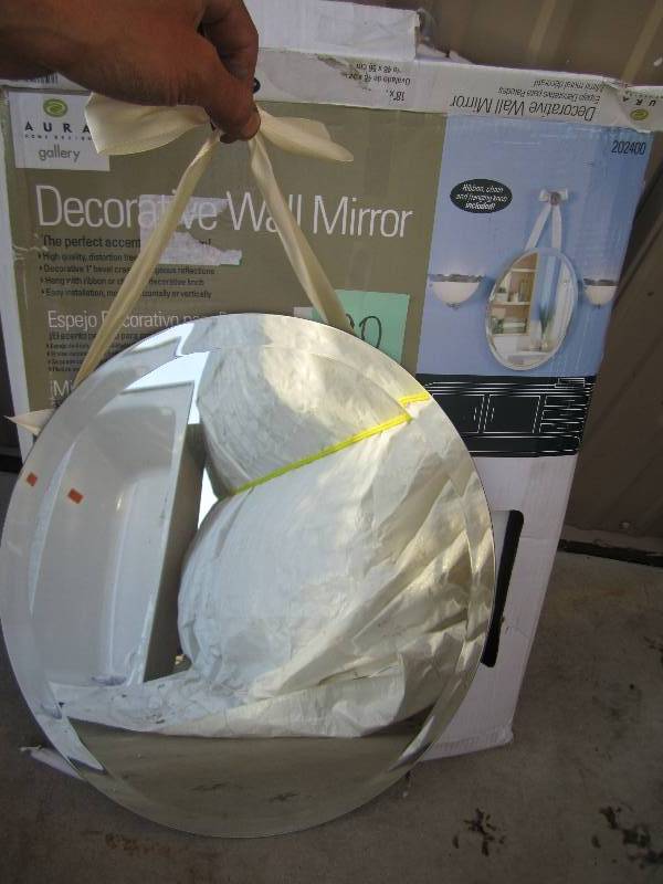 lot 90 image: 18 x 22 beveled edge oval mirror...