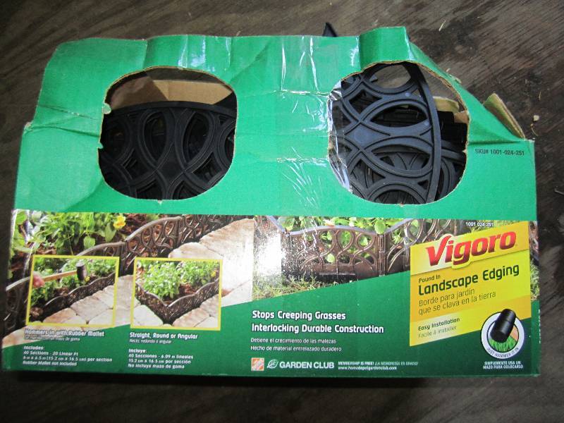 lot 91 image: Vigoro 20 ft. Scroll Design Interlo...