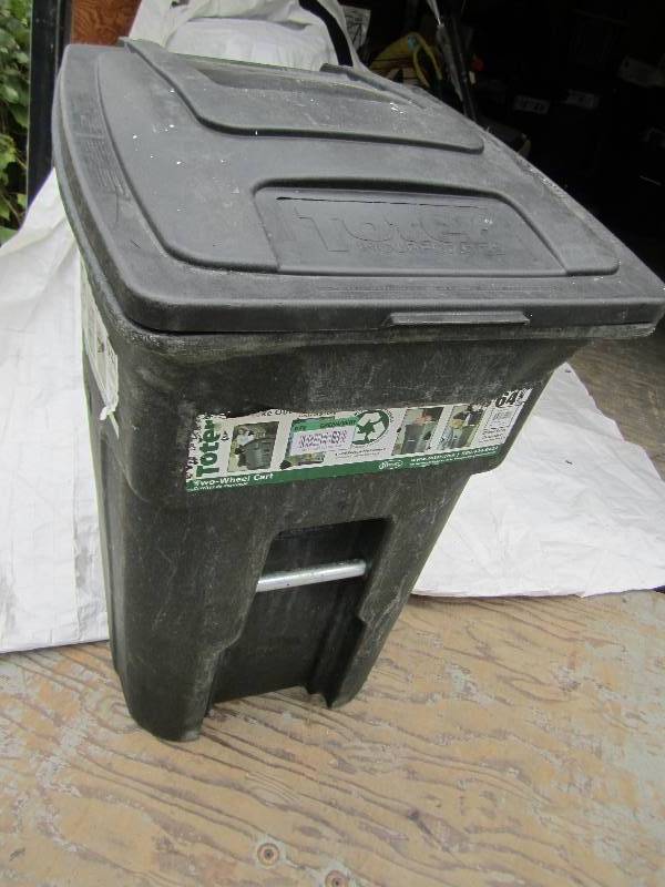 lot 126 image: Toter 64 Gal. Green Wheeled Trash C...