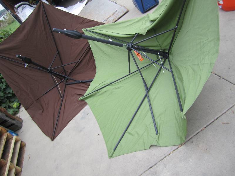 lot 150 image: 2 aluminum frame 9 foot umbrellas, ...