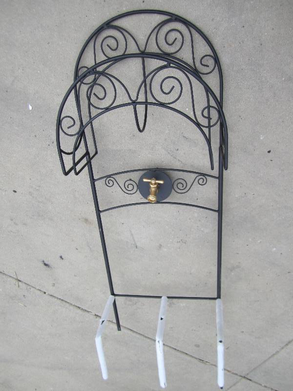 lot 153 image: Copper decorative hose stand...