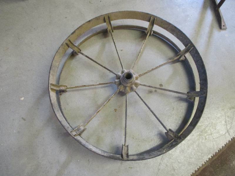 Antique metal tractor wheel, 30 ac...