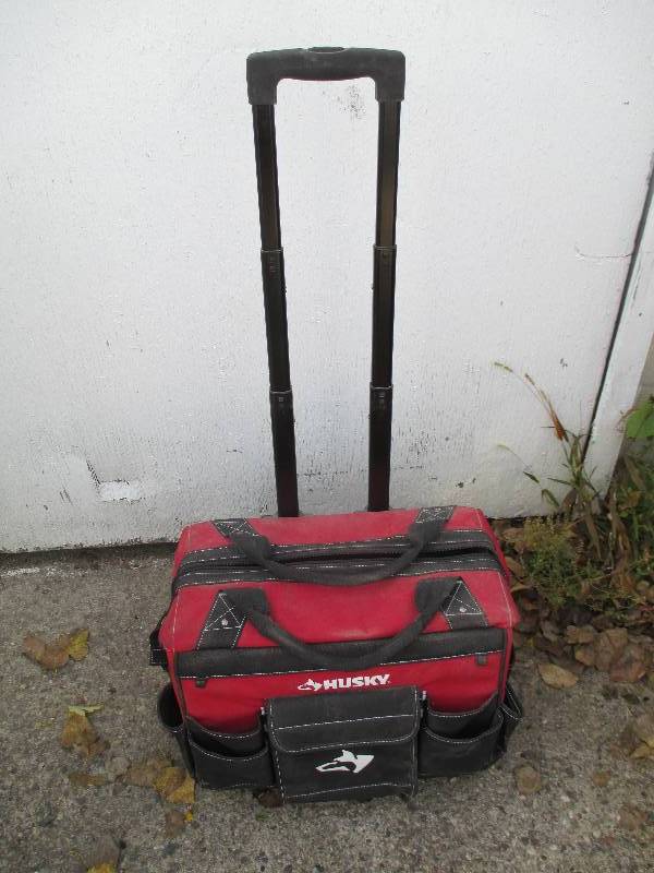 Husky tool case on wheels and retra...