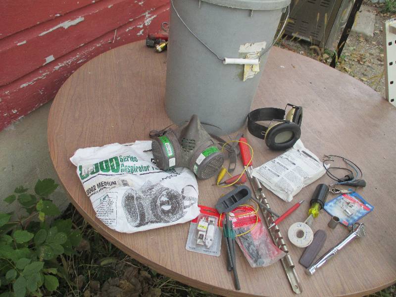 bucket filled with tools, respirato...