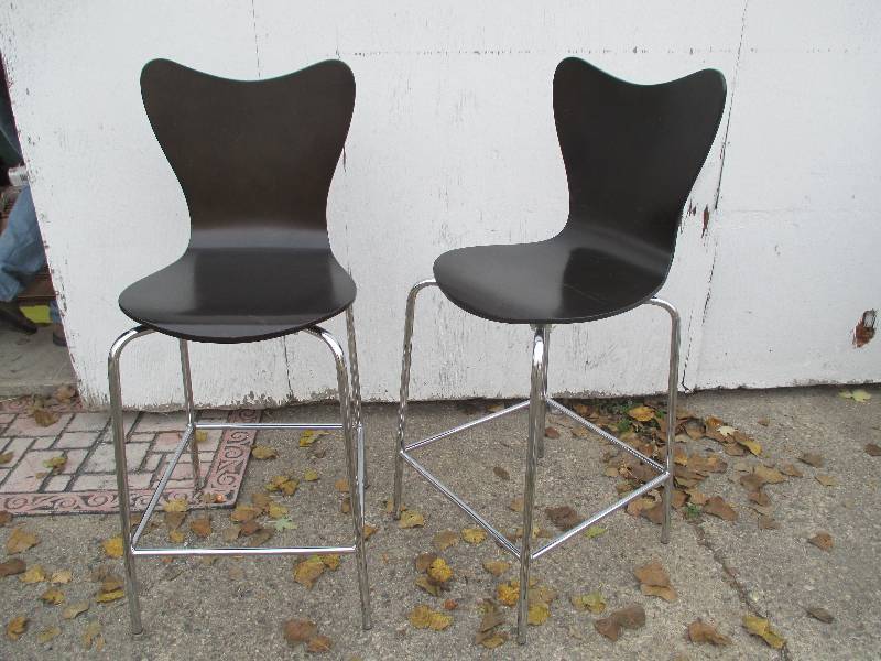 2 wood chair shells with metal base...