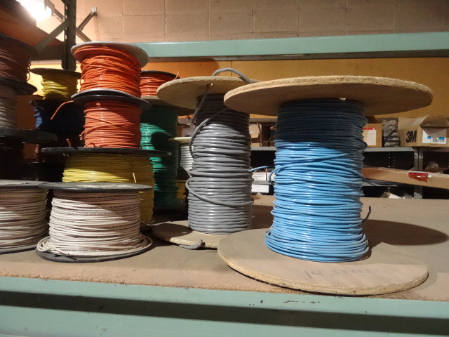 lot 115 image: Contents of Shelf. Rolls of Misc Wire