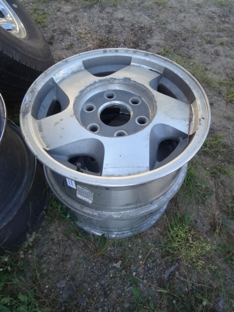 lot 11 image: 2 Aluminum GM Rims 6 Hole Rims