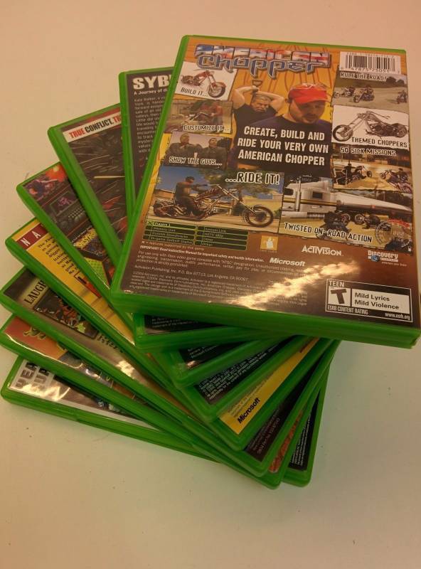 lot 40 image: Lot of Eight Used Games with Cases and Manuals for Xbox CLASSIC console
