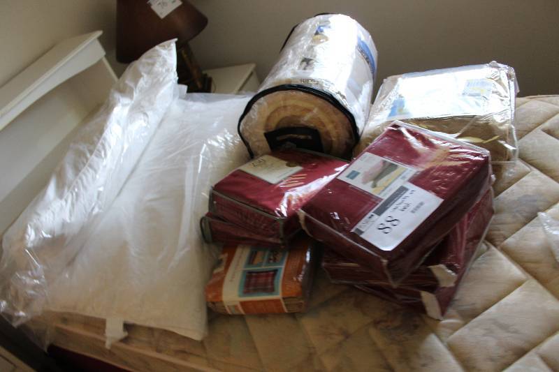 lot 88 image: Contents of Bed Including Bed Sheet Set Blankets And More.