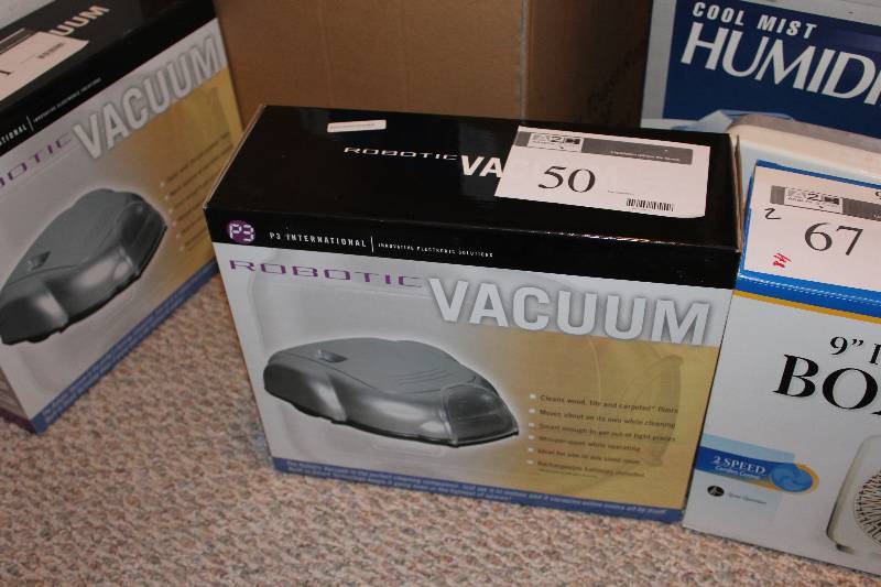 lot 50 image: P3 International Robotic Vacuum.