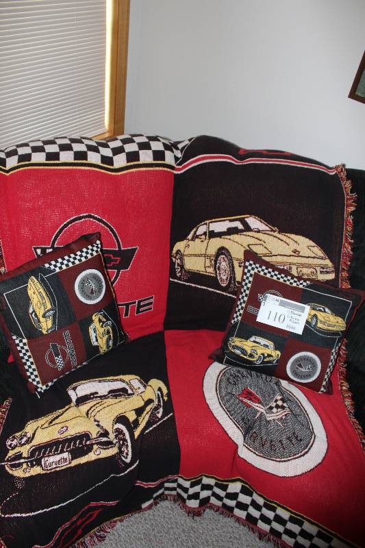 lot 110 image: Lot of (3) Including Corvette Blanket Corvette Throw Pillows (2).