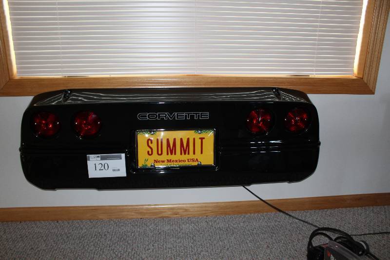 lot 120 image: Corvette Decoration wCord Back of Corvette.