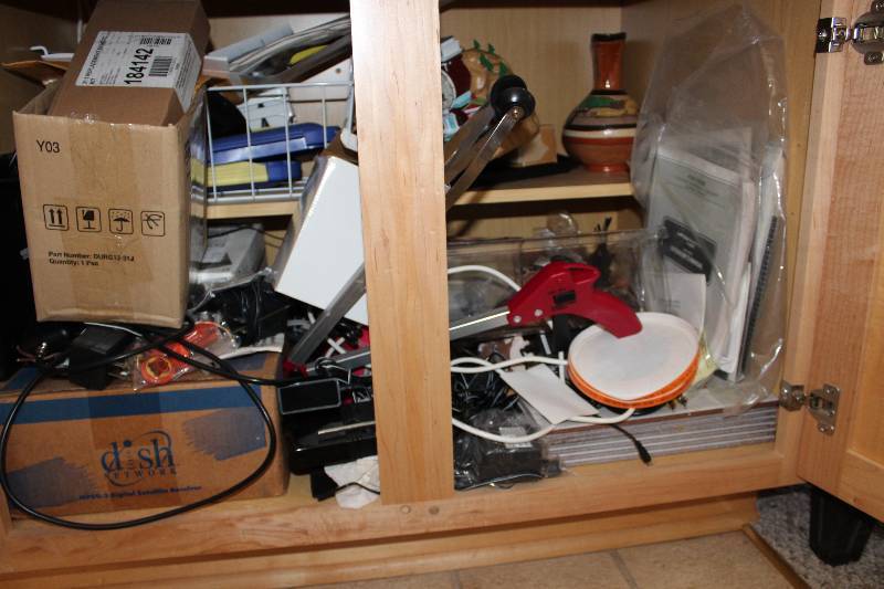 lot 236 image: Contents of Cupboard Including Decorative Vase Philips Decoration Cord And More.