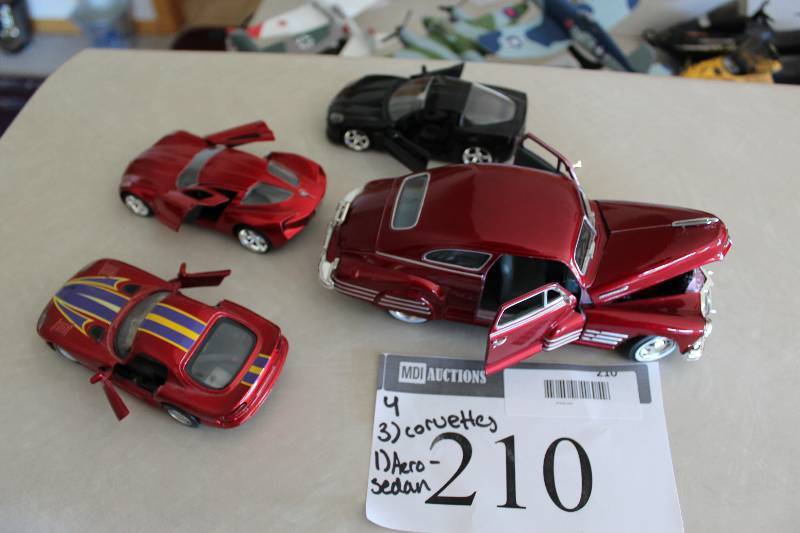 lot 210 image: Lot of (3) Collectible Toy Cars Including Aero-Sedan Corvettes (3).