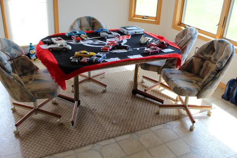 lot 517 image: Lot of (5) including Table Chairs wFabric Upholstery & Wheels.