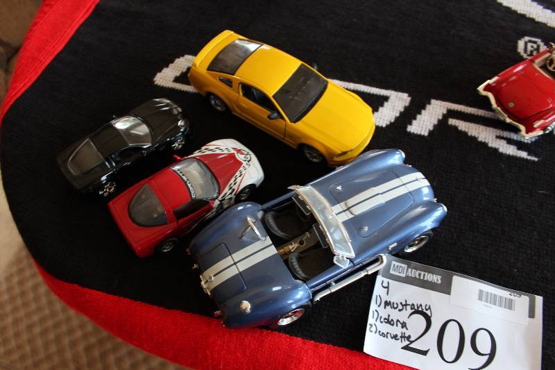 lot 209 image: Lot of (4) Collectible Toy Cars Including Mustang Cobra Corvette (2).