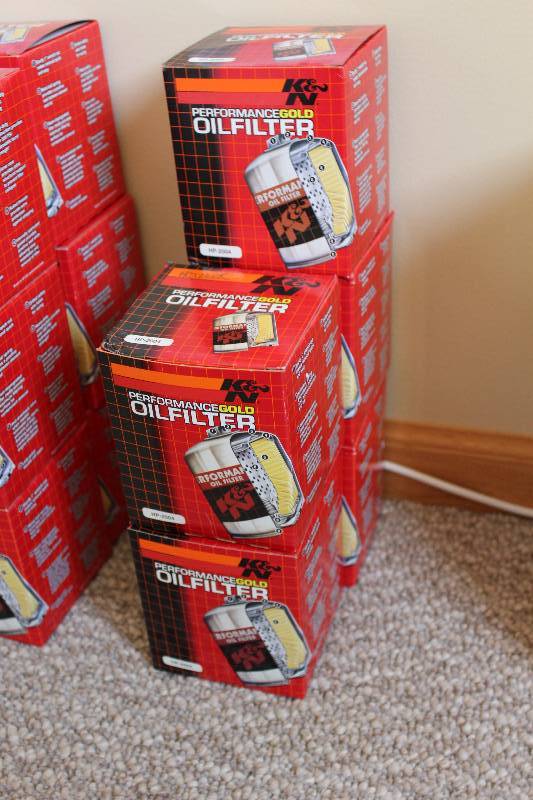 lot 263 image: Lot of (5) K & N Performance Gold Oil Filters.