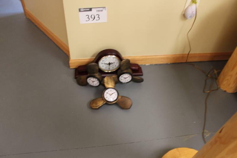 lot 393 image: Decorative Clock wMultiple Clocks & Propellers.