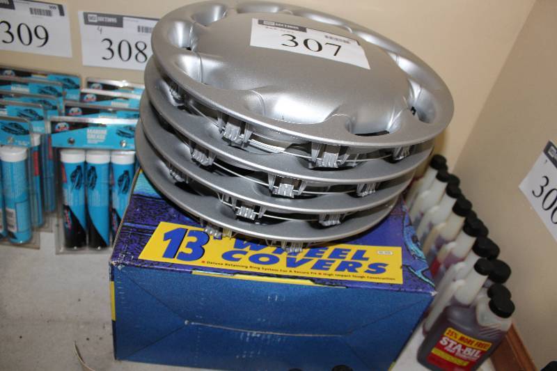 lot 307 image: Lot of 13 Wheel Covers Includes Suzuki Brand.