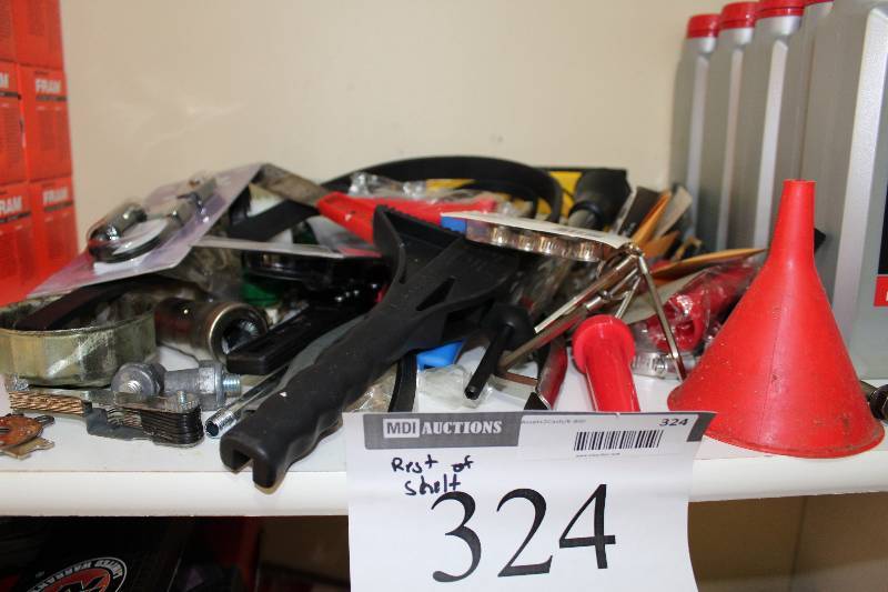 lot 324 image: Shelf lot Including Funnel Miscellaneous Tools Mobil Oil Quarts, app. 5 ct And More.