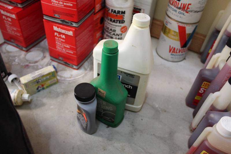 lot 331 image: Lot of (3) Power Steering Fluid Containers.