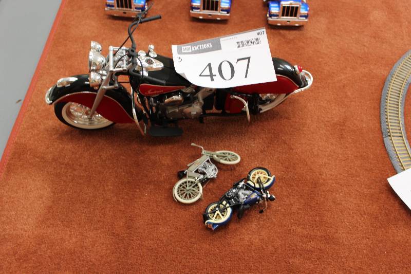 lot 407 image: Lot of (3) Motorcycle Decorations.