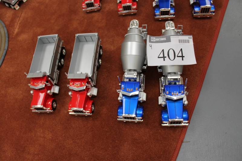 lot 404 image: Lot of (4) Toy Commercial Trucks.
