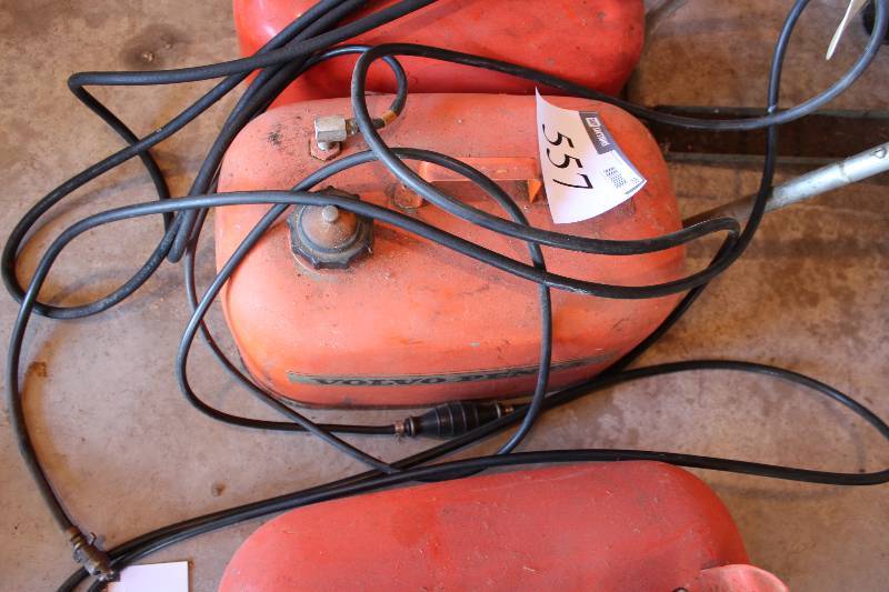 lot 557 image: Lot of (2) Gas Cans wHoses.
