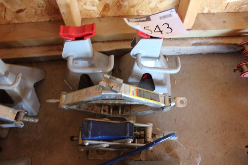 lot 543 image: Lot of (4) Including Tire Stands Car Jacks.