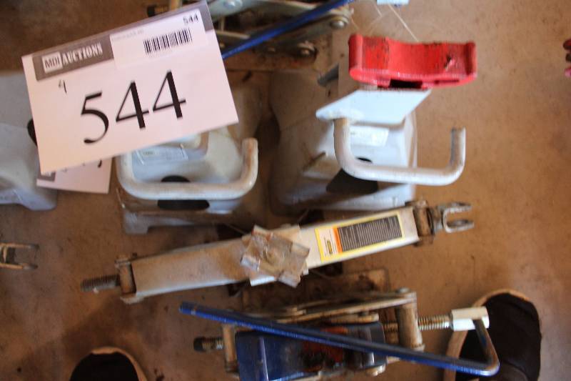 lot 544 image: Lot of (4) Including Tire Stands Car Jacks.