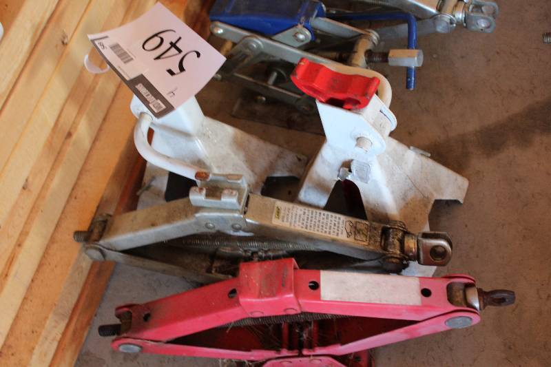 lot 549 image: Lot of (4) Including Tire Stands Car Jacks.