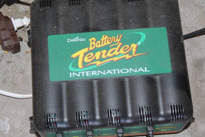 lot 579 image: Deltran Battery Tender  (4) Four Battery Style, 120 Volt AC Input , (4)  12 Volt DC outputs.