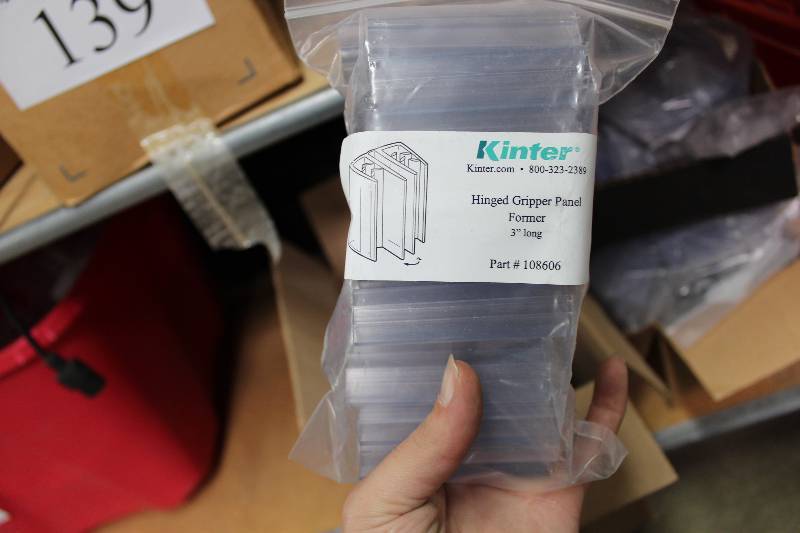 lot 142 image: Kinter Box Lot Including Hinged Gripper Panel Former Elliptical Banner Hanger, Aluminum And More.