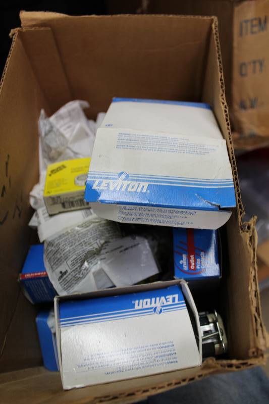 lot 139 image: Box Lot Including Electrical Outlet Leviton Plastic Piece Buss Fuses Tamper-Proof Adaptor And More.