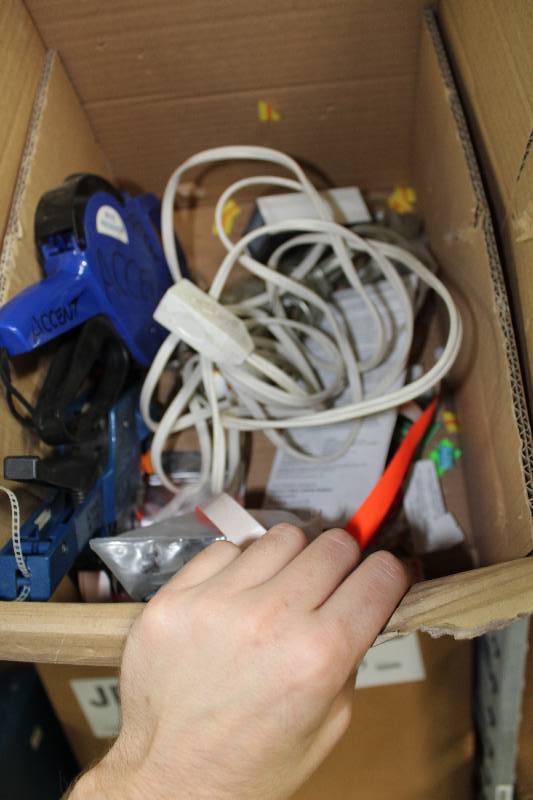 lot 126 image: Box Lot Including Pricing Gun Extension Cord And More.