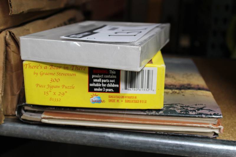 lot 131 image: Lot of (3) Puzzles.
