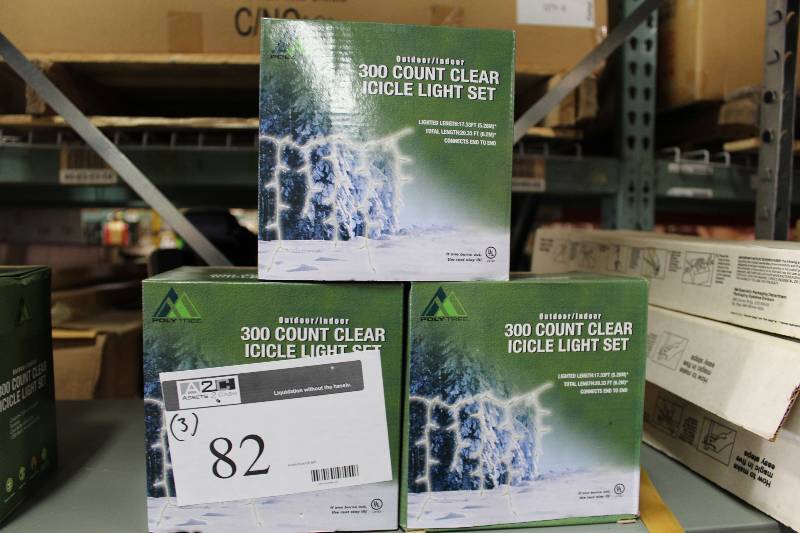 lot 82 image: Box Lot of (3) 300 Count Clear Icicle Light Set.
