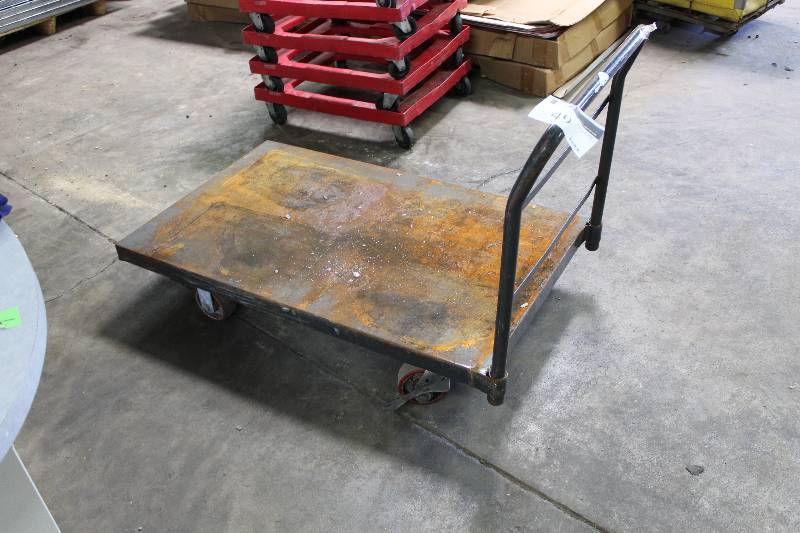 lot 49 image: Metal Push Cart wWooden Bottom 30 x 48 x 33.