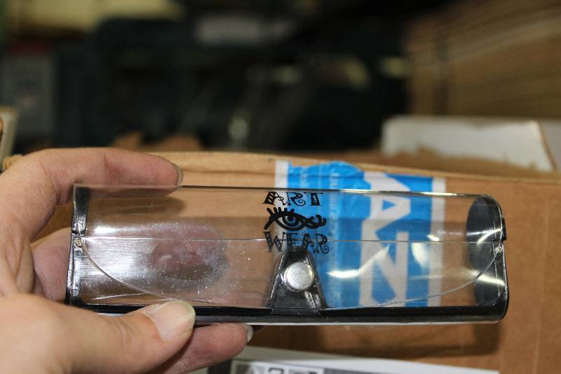 lot 57 image: Box Lot of Art Wear Sun Glass Cases.