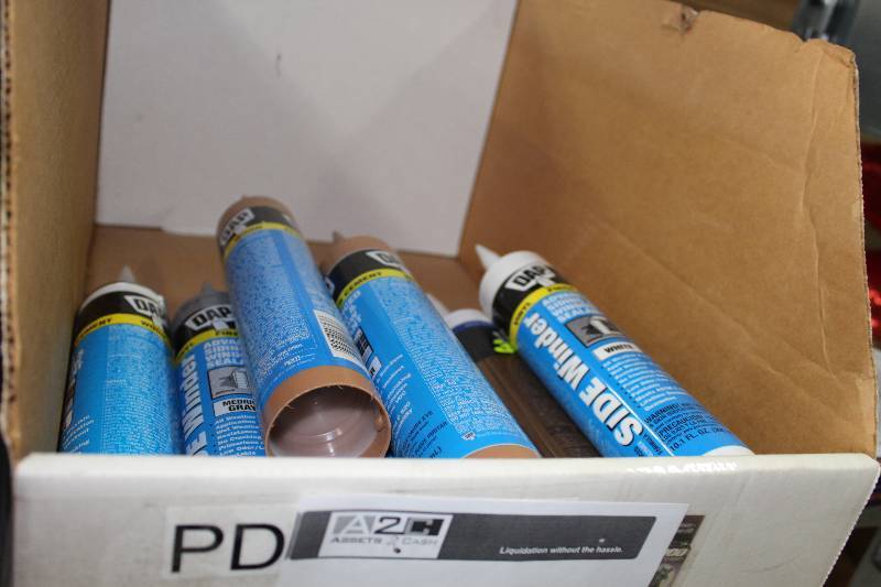 lot 58 image: Box Lot of DAP Advanced Siding & Window Sealant Side Winder Style Cedar Color.
