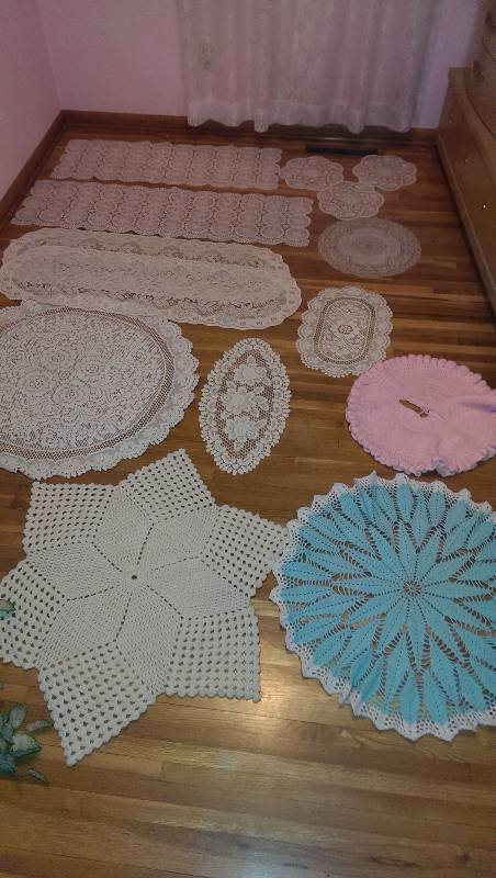 Variety of doilies (some vinyl and some crocheted)
