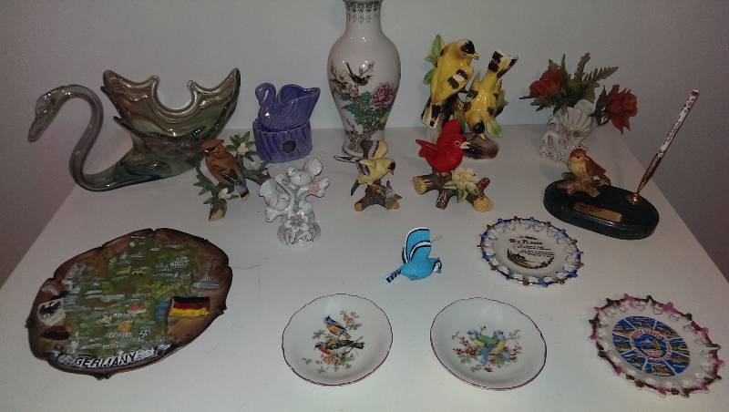 Variety of bird decorations and figurines