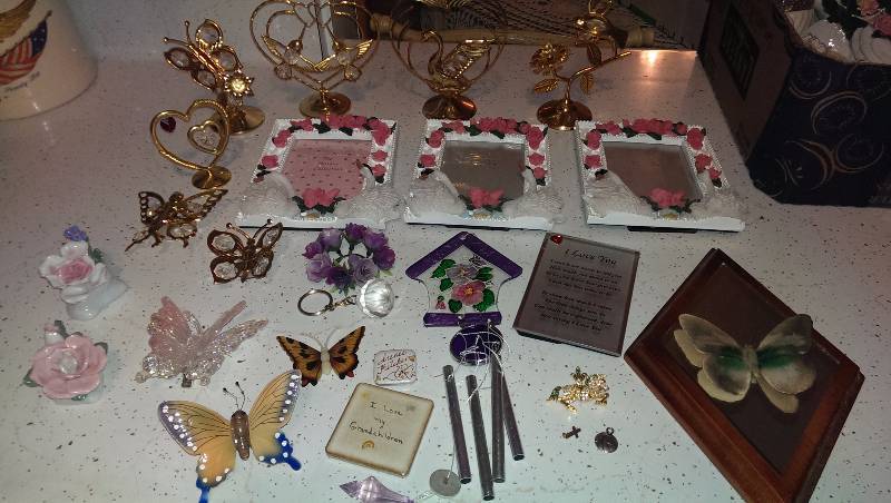 Three swan picture frames, magnets, butterfly decorations, sun catcher decorations