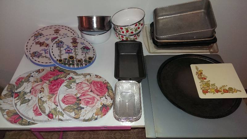 Cake pans, bar pans, cookie sheets, pizza pan, two sets of four stove covers