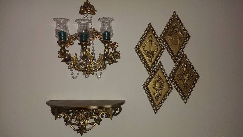 Wall sconces and a set of four wall plaques
