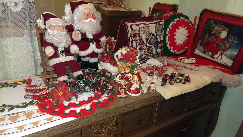 Santa decorations, xmas pillows, tree skirt, bells and figurines