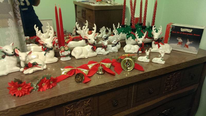 Reindeer figurines, bells, candle bras