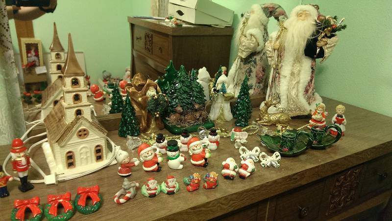 Santa and deer scene, lighted church, candle bras, napkin rings