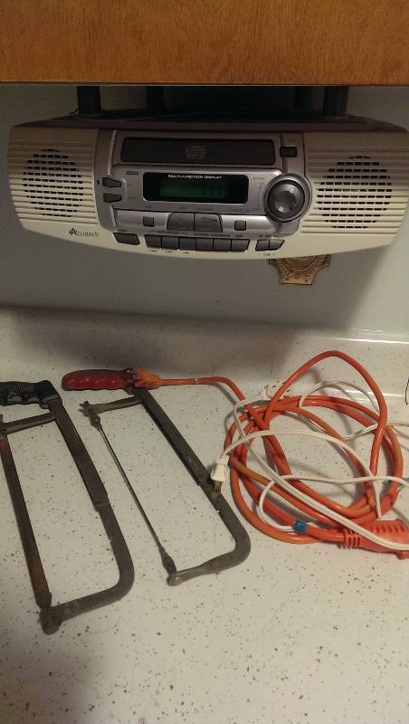 Undercounter CDRadioTimer, extension cords, saws